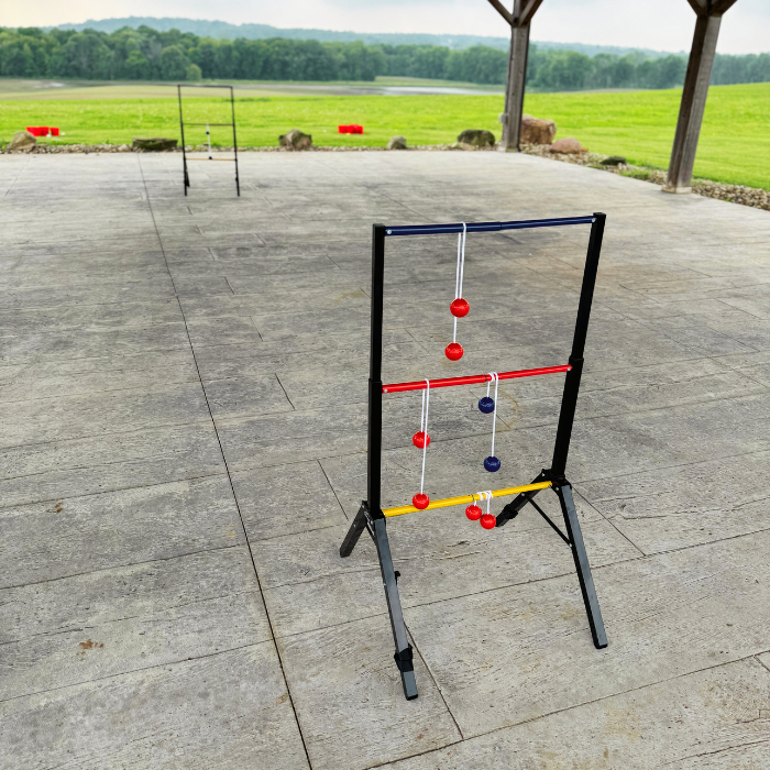 Lawn game set up on a patio with a scenic background