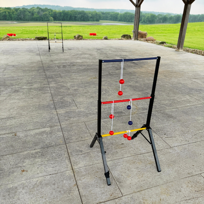 Lawn game set up on a patio with a scenic background